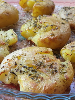 Una foto de Patatas con orégano