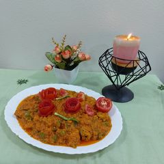 A picture of Chicken tikka masala.