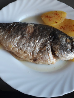 Una foto de Dorada jugosa al papillote