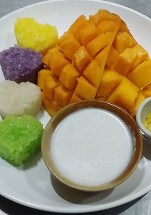 A picture of Colorful Sticky Rice with Mango.