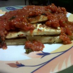 A picture of Pan Fired Tofu with Chunky Tomato-Basil Sauce.