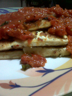A picture of Pan Fired Tofu with Chunky Tomato-Basil Sauce.