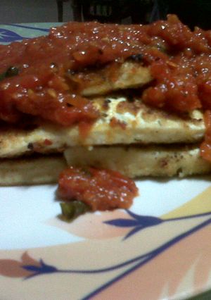 A picture of Pan Fired Tofu with Chunky Tomato-Basil Sauce.