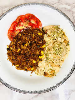 A picture of Vegetable fried rice with Fish fillet in cream sauce.