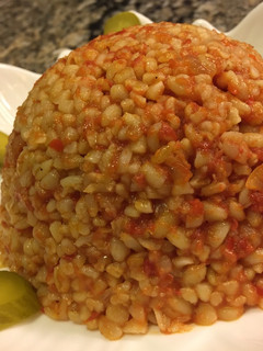 صورة لوصفة برغل على بندورة بالزيت
