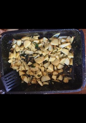 Una foto de Papas al horno con ajo y perejil