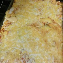 A picture of Lime cumin chicken enchiladas.
