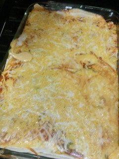 A picture of Lime cumin chicken enchiladas.