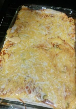 A picture of Lime cumin chicken enchiladas.