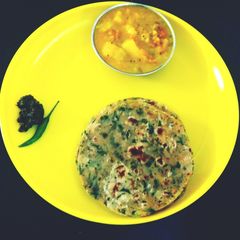 A picture of Curry leaves and Moong dal parathas.