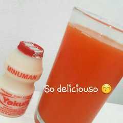 A picture of Carrot juice with yakult (jus wortel yakult).