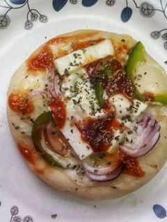 পনির পিজ্জা(Paneer pizza recipe in Bengali) রেসিপির প্রধান ছবি
