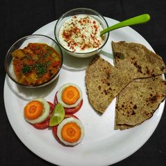 A picture of Multi Grain Chapati with Bottle Guard Curry.