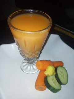 A picture of Carrot with cucumber and Ginger juice.