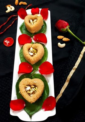 A picture of Designer Gulabe ahsaas Sooji Halwa.