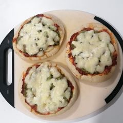 A picture of Mini Pesto Pizzas.