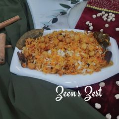 A picture of Kabuli Chana Pulao/ Dry White Chickpeas Pulao.