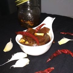 A picture of Sweet and sour raw papaya pickle.