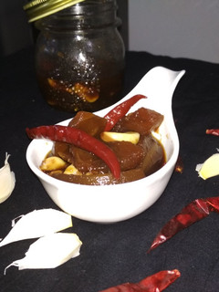 A picture of Sweet and sour raw papaya pickle.