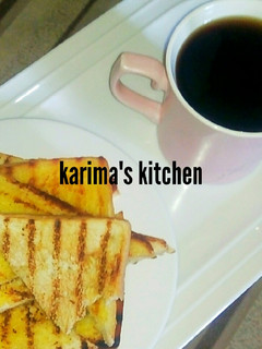 A picture of Butter toast/mint leaves tea.