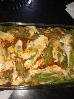 Una foto de Canelones con masa de acelga y relleno de carne picada y acelga!