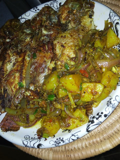 A picture of Pan grilled Tilapia and potatoes.