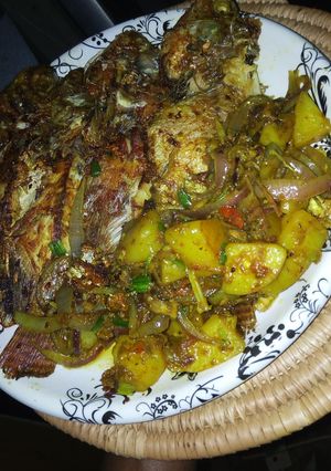 A picture of Pan grilled Tilapia and potatoes.