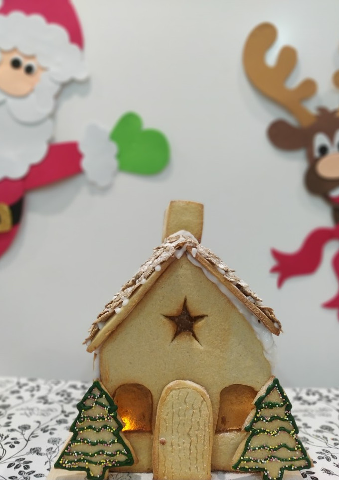 Una foto de Casita navideña de galletas