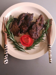 A picture of Marinated pan fried beef steak.
