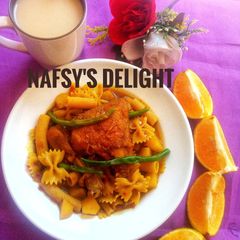 A picture of Macaroni n potato jollof with Nescafe.