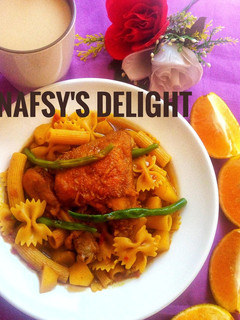 A picture of Macaroni n potato jollof with Nescafe.