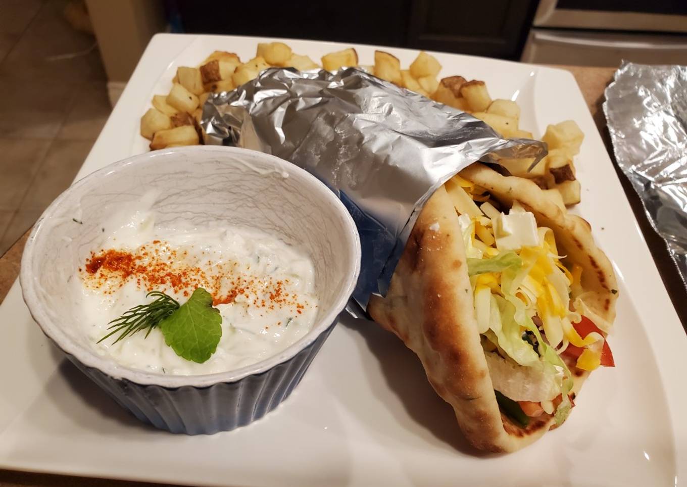 Grilled chicken gyros with Greek fries