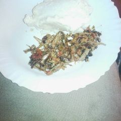 A picture of Ugali served with omena.