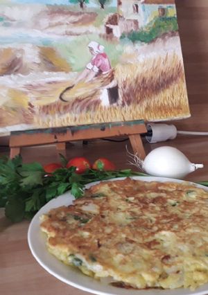 Foto di Frittata di cipolle con contorno di pomodori 🥚🍅