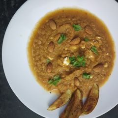 A picture of Gazpacho Soup with crispy Potato.