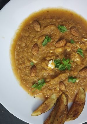 A picture of Gazpacho Soup with crispy Potato.