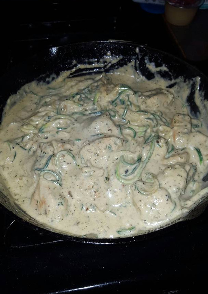 A picture of Zucchini Noodles with Pesto Chicken and Garlic Alfredo sauce.