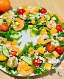 Salad "Wreath" of spinach with shrimps and tangerine