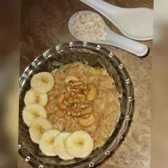 A picture of Oatsmeal with Milk.