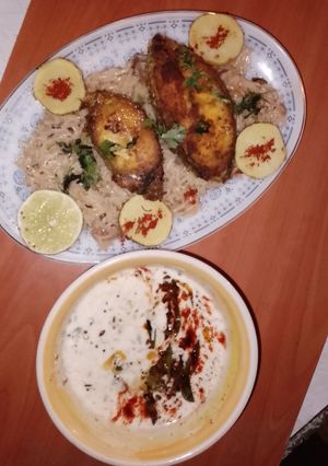 A picture of 🐟 fish pulao and okra ratia.