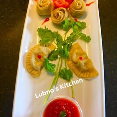 Veg & Cheesy Dumpling (Momos) A picture of Veg & Cheesy Dumpling (Momos).