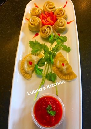 A picture of Veg & Cheesy Dumpling (Momos).