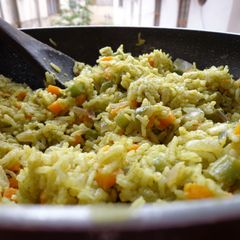 A picture of Corriander rice with vegetables.