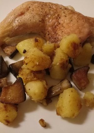 A picture of Crispy chicken with sautéed potatoes and porcini mushrooms.