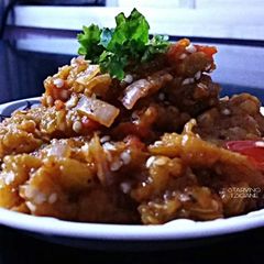 Baingan bharta (eggplant stir fry) A picture of Baingan bharta (eggplant stir fry).