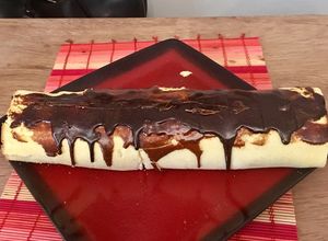 Una foto de Pionono de palmitos, jamón, queso y mayonesa