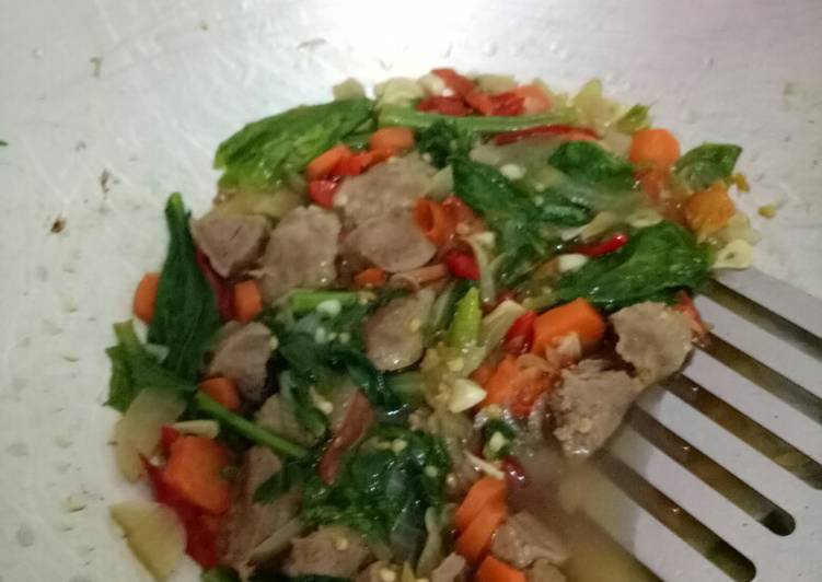 Tumis sawi bakso pedas