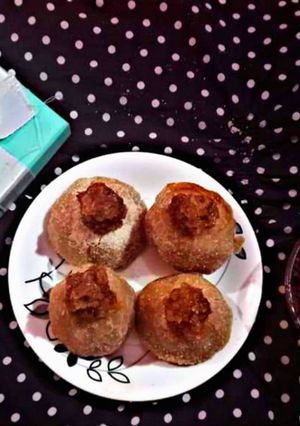 নারকেলের পুঁটলি (narkeler putuli recipe in Bengali) রেসিপির প্রধান ছবি