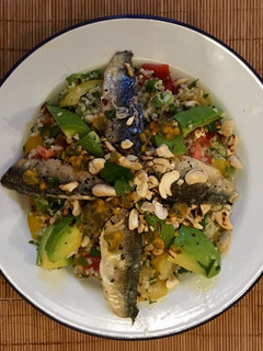 A picture of Fresh sardines with Tabbouleh Salad.