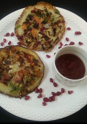A picture of Vegetable Rava Uttapam.
